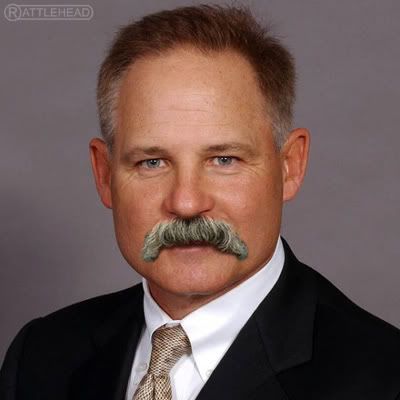 ... classic handlebar moustache...